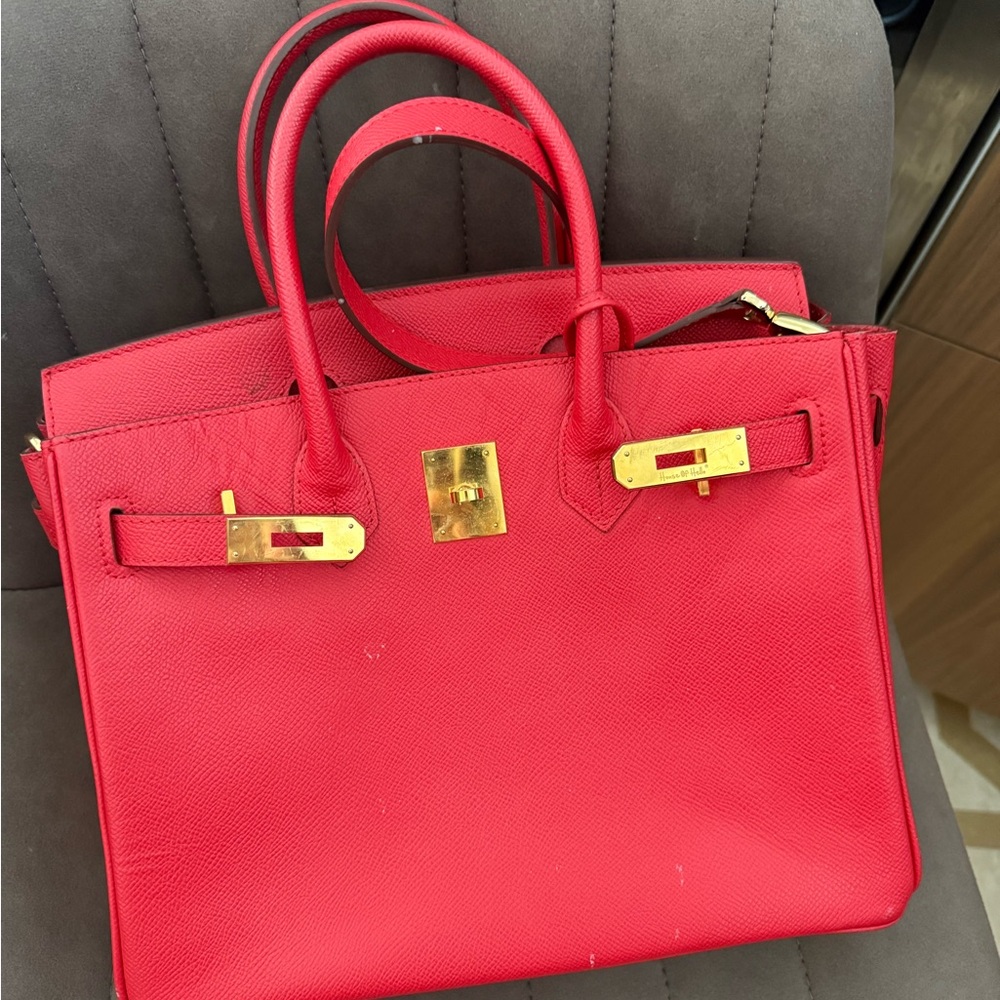 Chic Red Satchel with Gold Accents